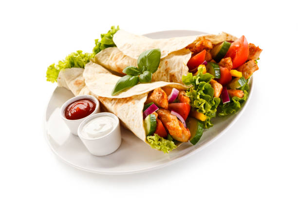 istock Kebab - grilled meat and vegetables on white background 1029817104