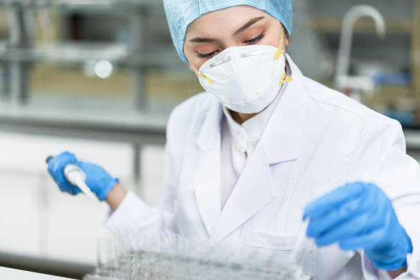 istock Young female scientist working in the laboratory 1029821698