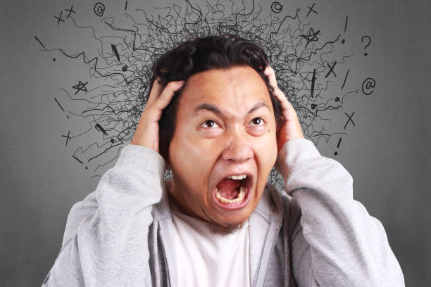 istock Young Man Frustrated, headache and dizzy gesture 1029821824