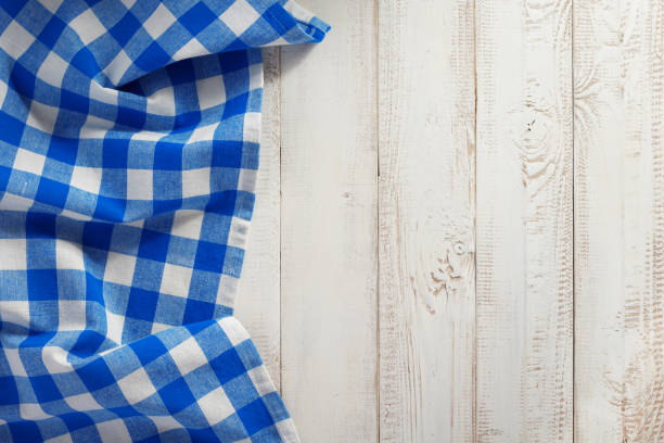 istock napkin cloth on wooden background 1029825342