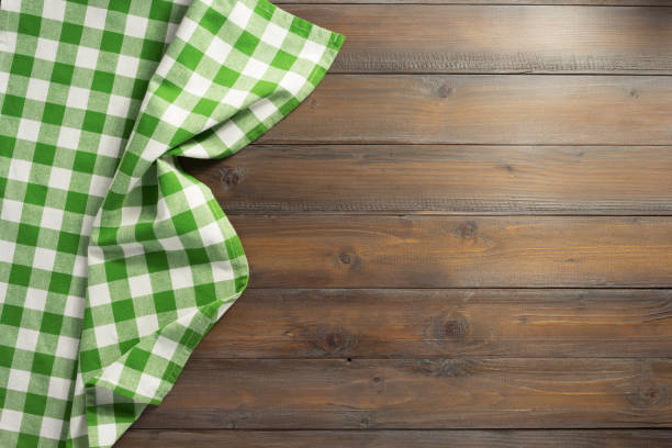 istock napkin cloth on wooden background 1029825386