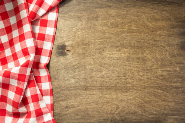 istock napkin cloth on wooden background 1029825790