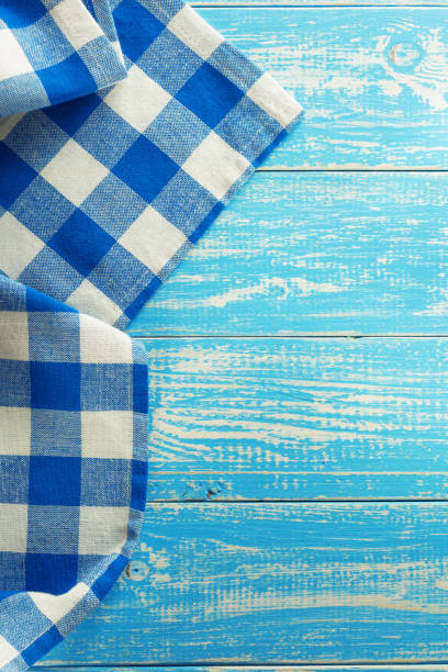 istock napkin cloth on wooden background 1029825836