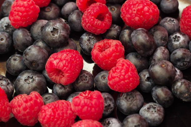 istock Mix of blueberries and raspberries. 1029833752
