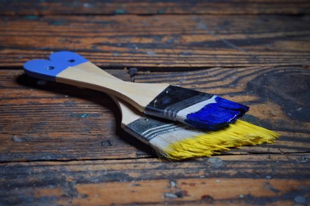 istock Close-Up Of Paintbrushes On Wood 1029838504