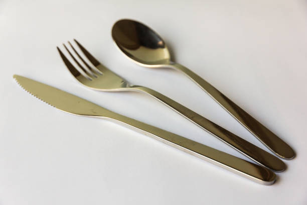 istock Set of cutlery (knife, fork, spoon) on a white background 1029854364