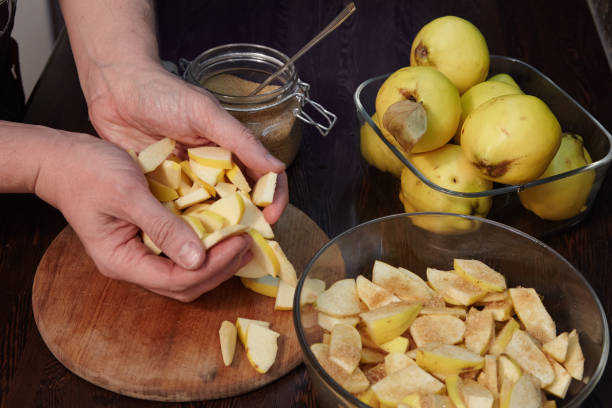 istock The man cooks quince jam 1029864846