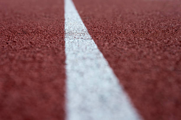 istock running track rubber standard red color and white line 1029865402