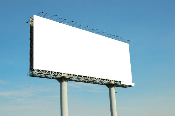 istock Low Angle View Of Billboard Against Clear Blue Sky 1029866340