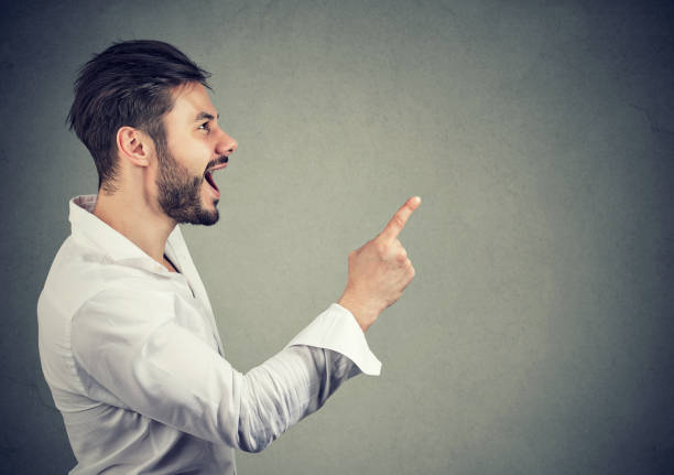 istock Casual man pointing up has an idea 1029873372