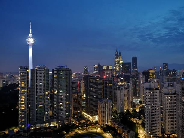 istock Kuala Lumpur cityscape during dusk hours 1029877132