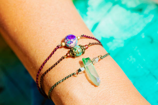 istock Female hand wearing natural stone bead bracelets 1029888866