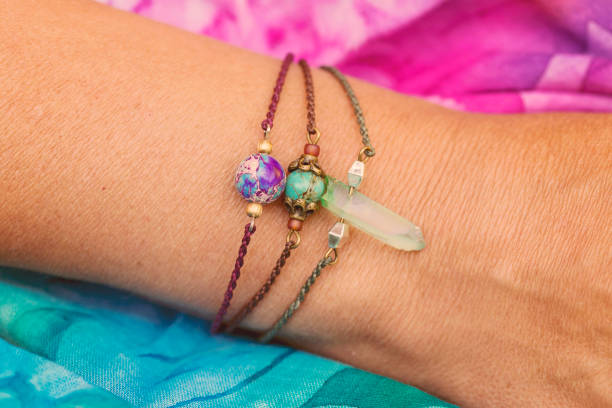 istock Female hand wearing natural stone bead bracelets 1029889362