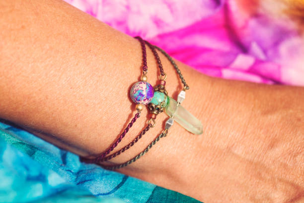 istock Female hand wearing natural stone bead bracelets 1029891462