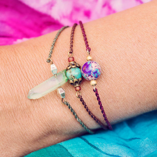 istock Female hand wearing natural stone bead bracelets 1029891476