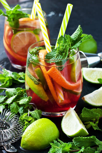 istock Glass of fresh  lemonade  with mint on dark background 1029894872