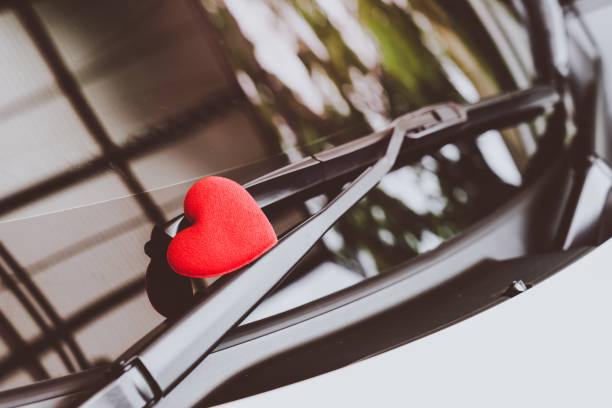 istock love letter heart on a sticky note under a windshield .vintage  color style 1029895088
