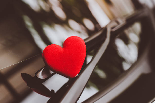 istock love letter heart on a sticky note under a windshield .vintage  color style 1029895108