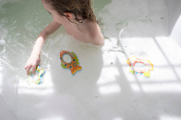 istock Little girl in the bath 1029899812