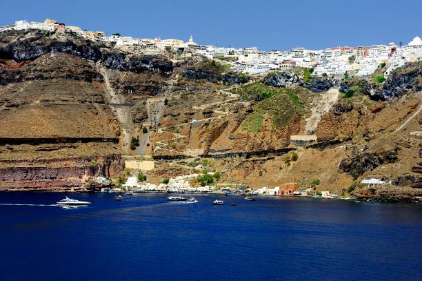 istock White houses clinging to the cliff tops 1029902720