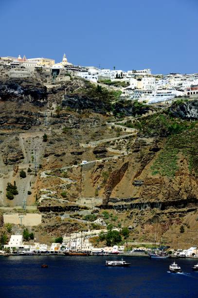istock White houses clinging to the cliff tops 1029902742