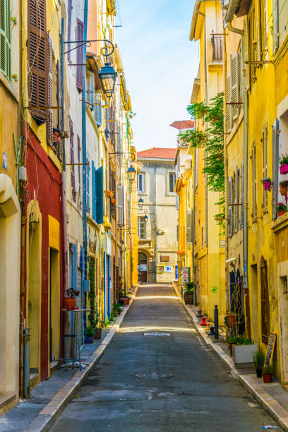 A narrow street in the Le Panier district of Marseille, France A narrow street in the Le Panier district of Marseille, France marseille stock pictures, royalty-free photos & images