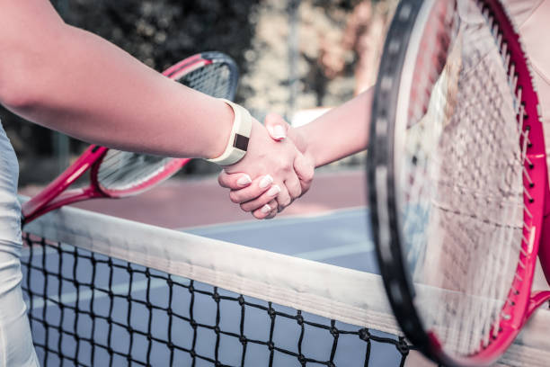 istock Confident female players jiggling hands before game 1029912544