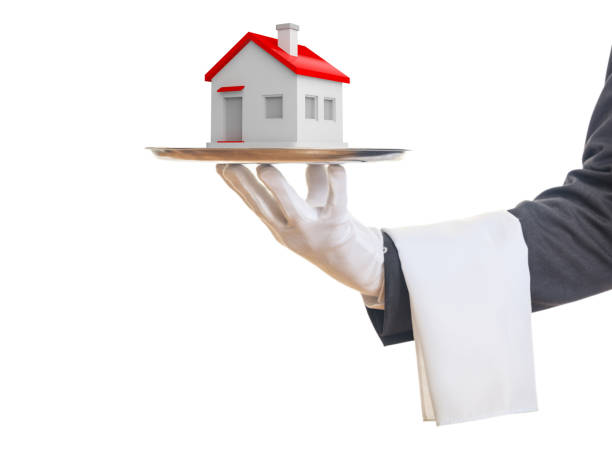 istock 3d rendering waiter offering a house 1029918690