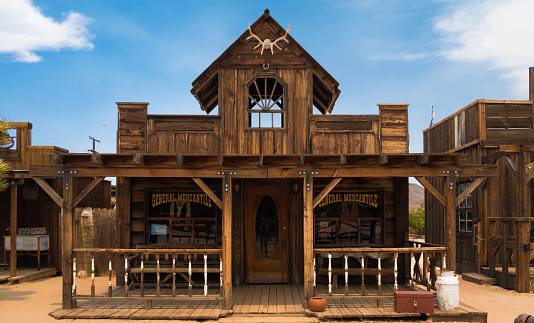 A former Wild West movie set Pioneertown in California. The town was built and used as a decor for many Wild West movies, now it is a tourist attraction. Here are the wooden buildings on the Mane street.