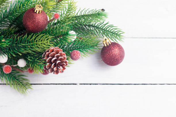 istock Christmas fir branches with different decorations. Rustic Christmas. Top view flat lay. White old desk. 1029940038