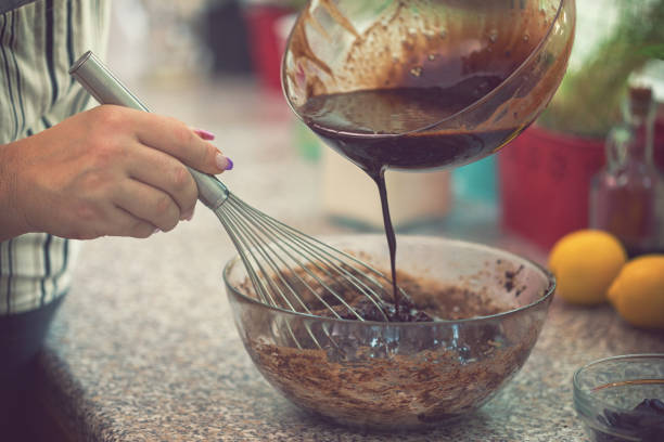 istock Woman Preparing Chocolate Brownies 1029940292