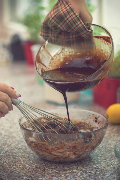 istock Woman Preparing Chocolate Brownies 1029940296