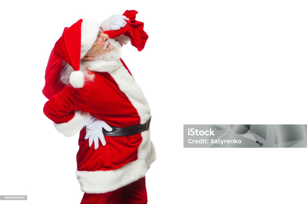 https://media.istockphoto.com/id/1029943090/photo/christmas-santa-claus-is-suffering-from-back-pain-and-holds-a-red-bag-with-gifts-on-his-back.jpg?s=1024x1024&w=is&k=20&c=7A6I4f2reZibpaiLkHqcjLdEDotGGm2ZYAtMFcOxCfo=