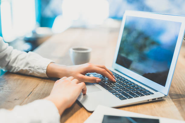 istock The woman hands work with a modern laptop 1029943984