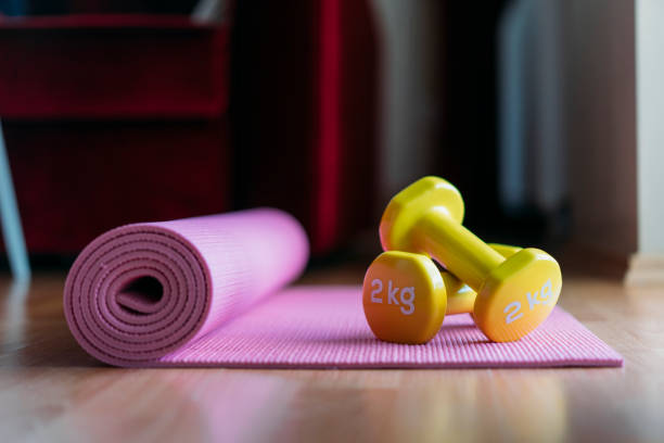 istock Exercise equipment on the floor at home 1029944190