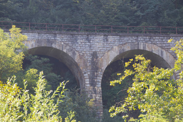 istock Old stone railroad viaduct in mountains 1029944206