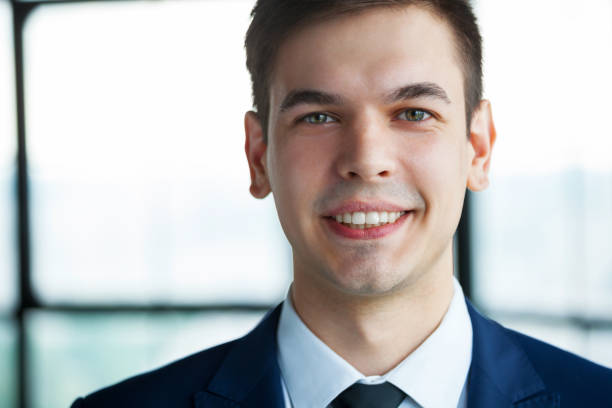 istock Portrait of young handsome business man. 1029950106
