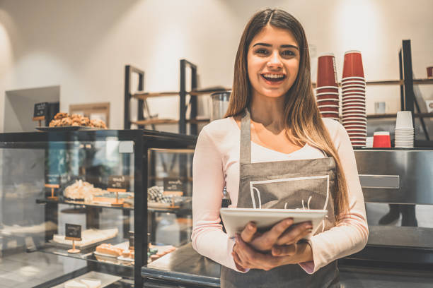 istock The happy waitress holding a tablet and accept the order 1029955730