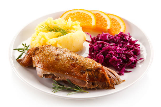istock Roast duck breast mashed potatoes and vegetables 1029958106