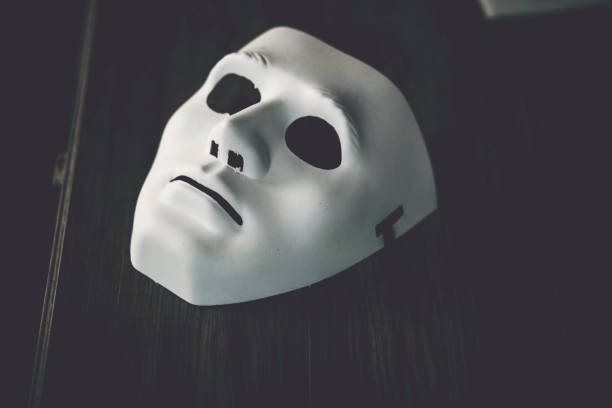 istock Facial sheet white mask on black background 1029975602