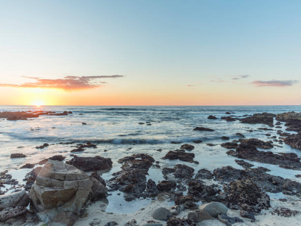 istock sunset over carmel beach,California 1029985106