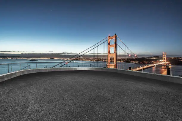 Photo of empty balcony front of Golden Gate Bridge against sky