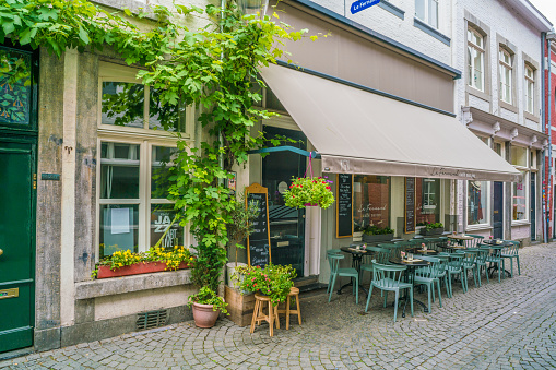 Maastricht, The Netherlands - June 18th 2018, small restarant in the 'Stokstraat' in the historic center of Maastricht