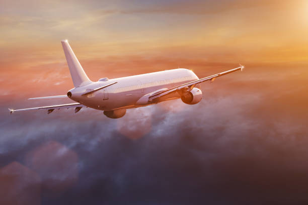 istock Commercial airplane flying above dramatic clouds 1029998872