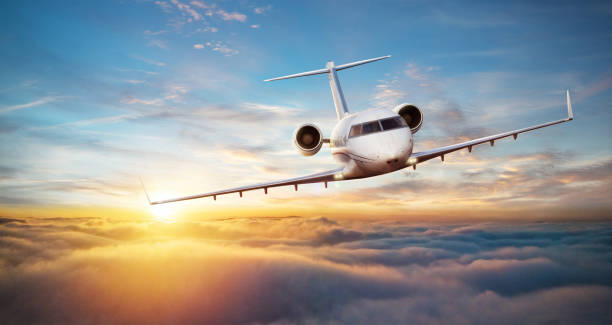 istock Luxury private jetliner flying above clouds 1030007602