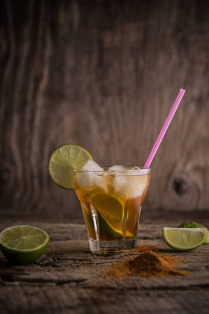 istock Retro glass with refreshing ice tea with lime and cinnamon 1030007890