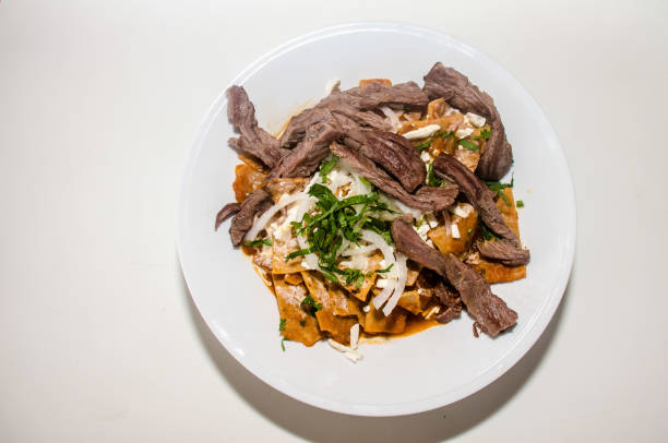 istock Mexican red chilaquiles with arrachera 1030008178