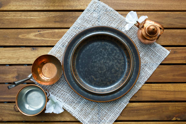 istock Copper old scratched vintage crockery kitchenware on the table 1030010194