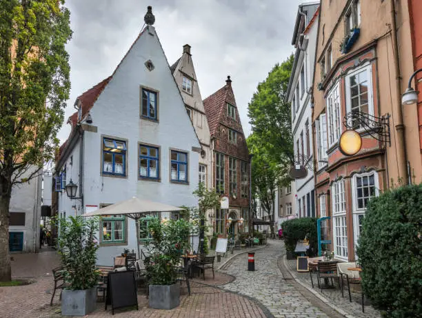 Schnoor is a district in the medieval centre of Bremen city. Medieval narrow alleys in the old town of Bremen which house a lot of small shops, boutiques, cafes and restaurants