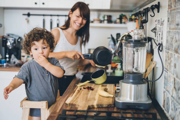 istock Mother and son cooking 1030018484